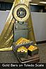 Looks like one has to go.-gold-bars-toledo-scale-72.jpg