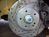 Centric drilled and slotted rotors complete with posi quiet brake pad set for sale-passenger-front.jpg