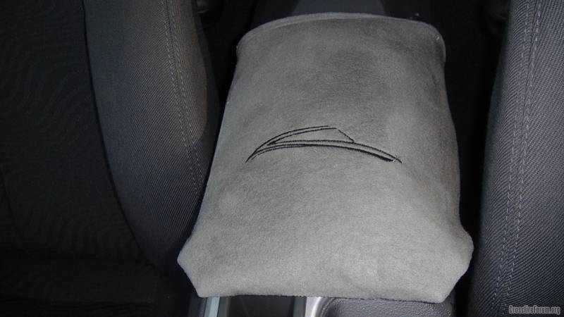 /quote
Your thread was "anyone make or buy cushion for center console" Picture posted in my post.
Your thread was "anyone make or buy cushion for center console" Picture posted in my post.
Hello,
I bought one. See below link, Crossfire Genuine Leather padded armrest.
- autoXclusive
But I need something for my other elbow on the door side now!
Regards
AR
I bought one. See below link, Crossfire Genuine Leather padded armrest.
- autoXclusive
But I need something for my other elbow on the door side now!
Regards
AR
A fellow member smfrycruzr (actually Terry's wife) has made me this high quality alcantara console cover with an embroidered XF coupe outline on the top. I selected the materials and colors and just waited. What I received was a very high quality cover that matched my shift boot and custom **** very well.
The pad itself slides over the conter console when it is opened and hangs over the front on top maybe an inch (it ends just about where my storage bin starts) and allows for full closing (and latching) of the console. It was a bear to get it on there, but it isn't going anywhere and fits nicely.
This is one of the few mods that the GF actually got excited about, now she will not have bruises on her arms from trying to keep her skinny rear end in the seat when we are going through the Dragon
.
Thanks Terry.
![